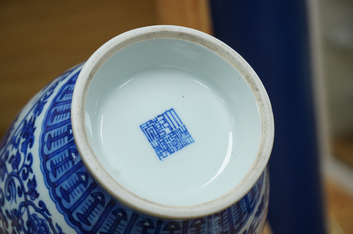 A Chinese blue and white 'peaches' vase, Qianlong mark but later, 27cm high. Condition - good